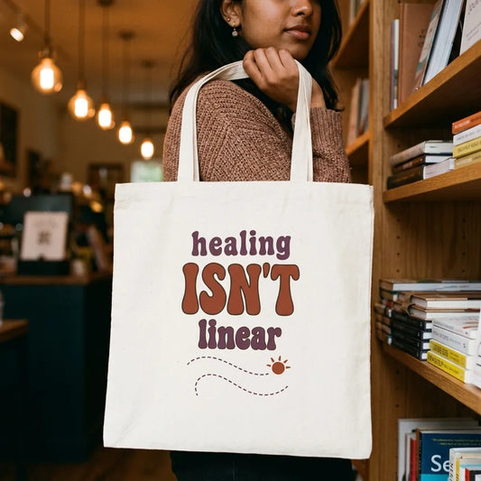 Healing Isn't Linear soft retro mental health cotton tote bag — lifestyle