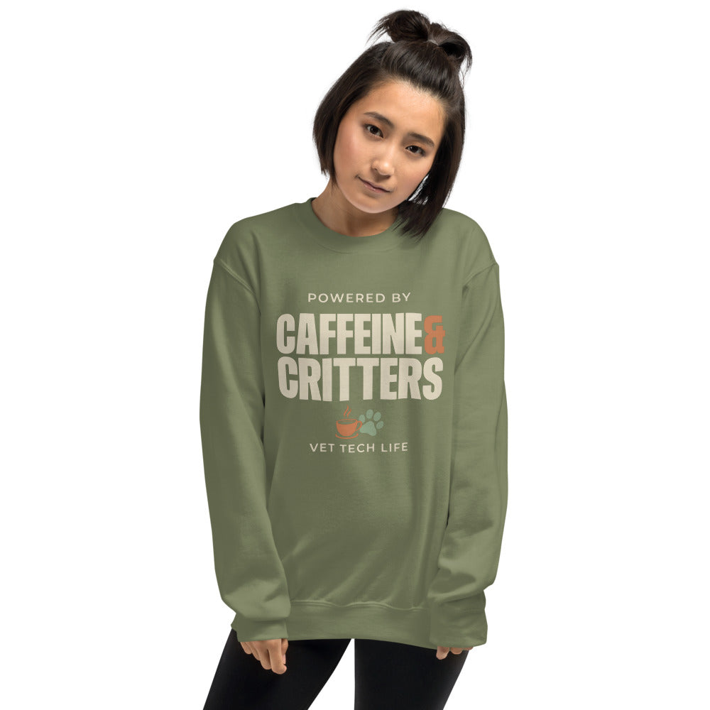 Powered by Caffeine & Critters funny vet tech crewneck sweatshirt — Military Green, on model