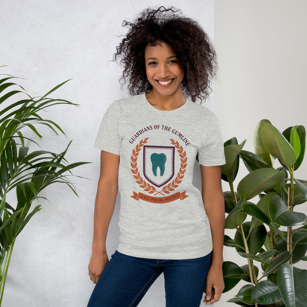 Guardians of the Gumline dental hygienist tee — Athletic Heather, on model