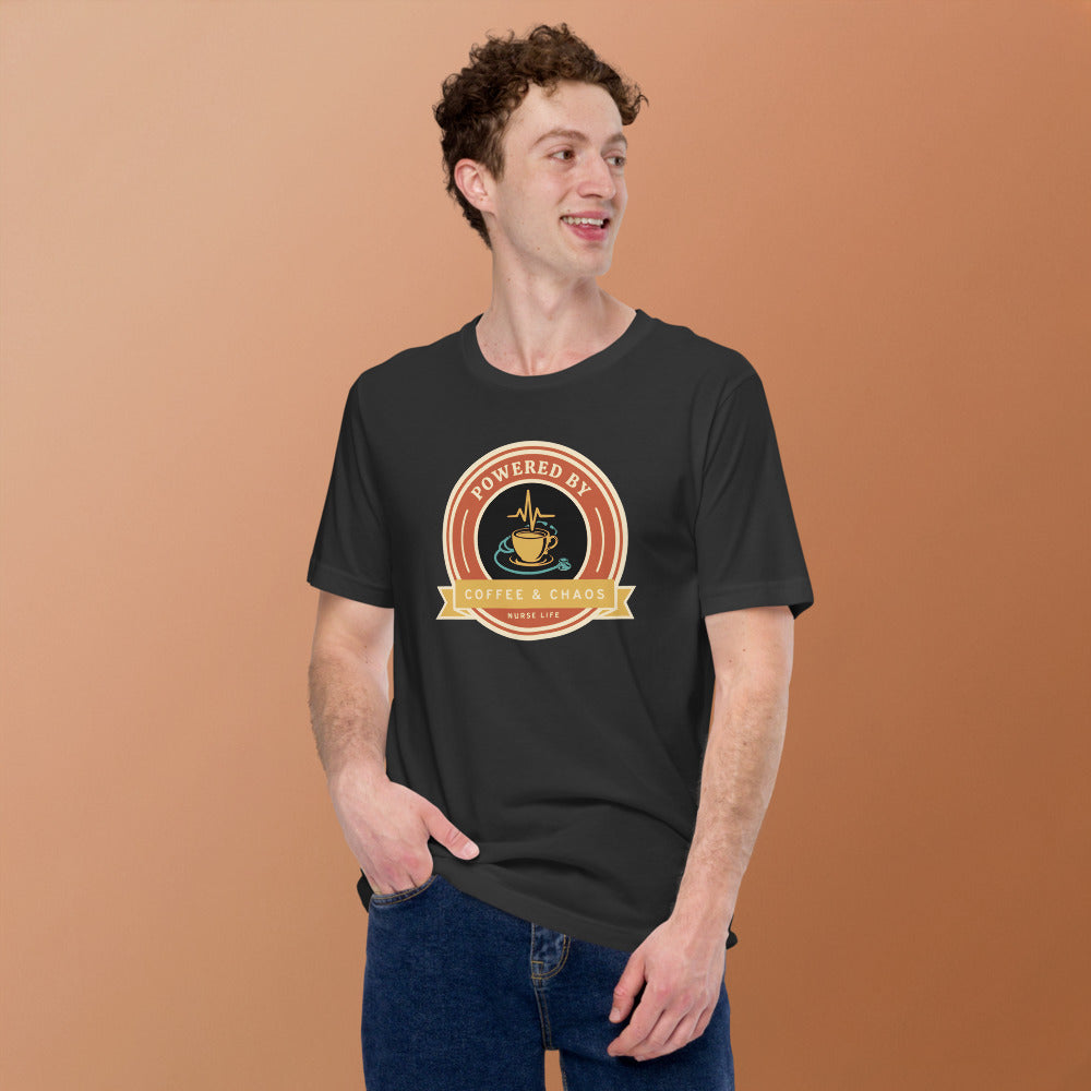 Powered by Coffee & Chaos retro nurse badge tee — Dark Grey, on model