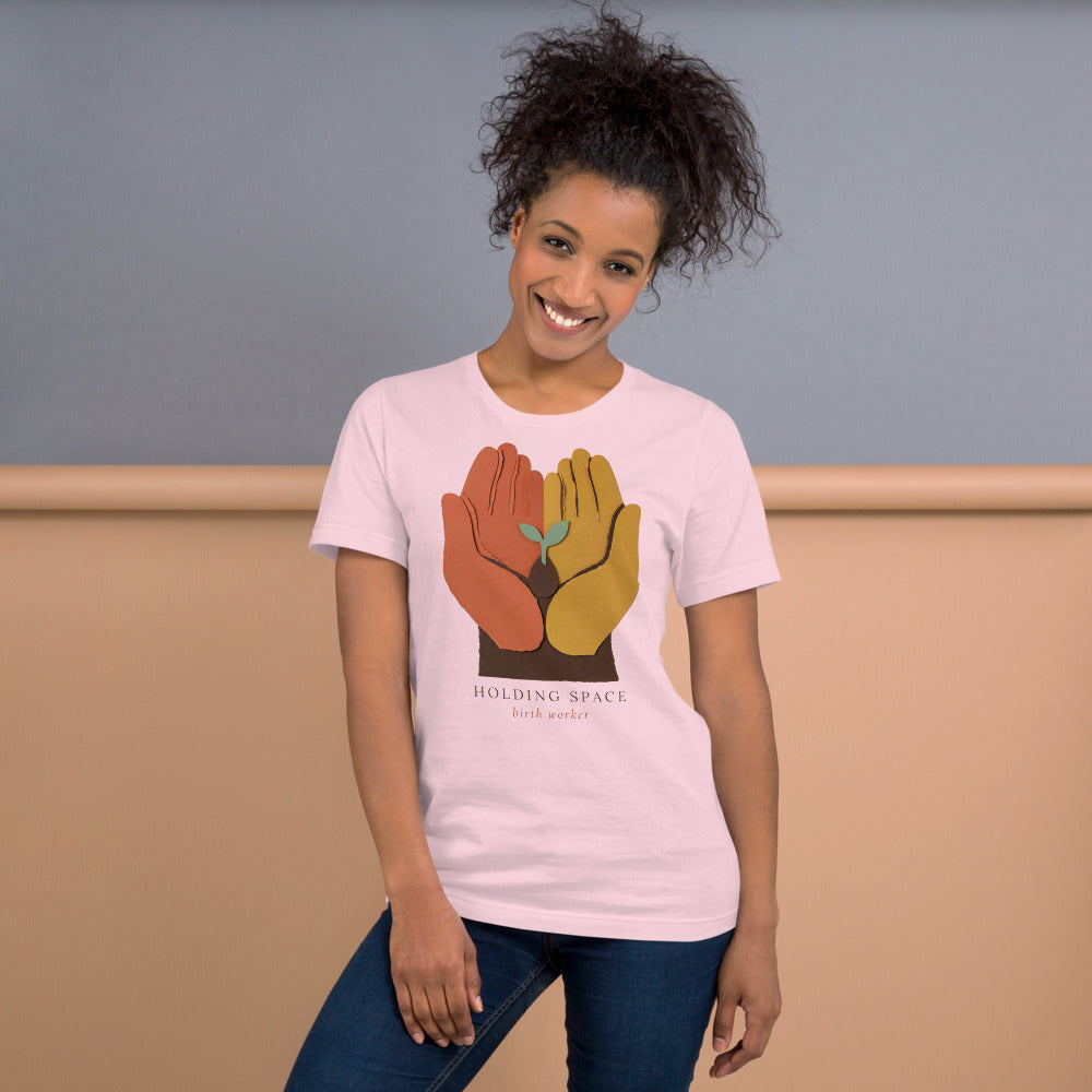 Holding Space birth worker doula t-shirt — Soft Pink, on model