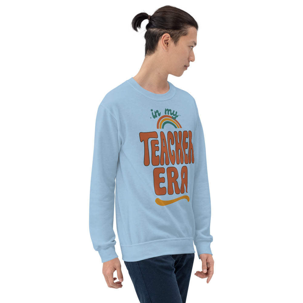 In My Teacher Era retro groovy teacher crewneck sweatshirt — Light Blue, on model
