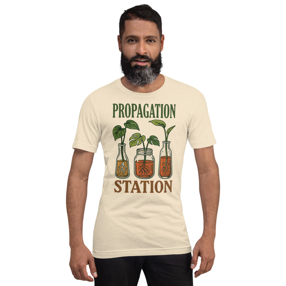 Propagation Station retro botanical plant lover tee — Heather Natural, on model