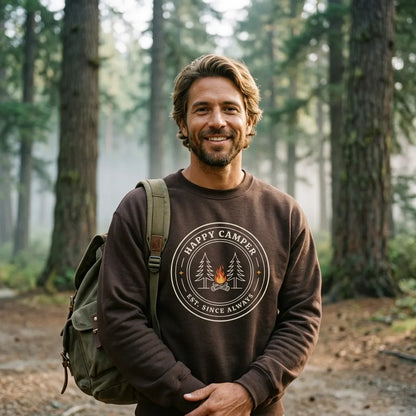 Happy Camper camp badge crewneck sweatshirt — man at a misty forest trailhead, Dark Chocolate