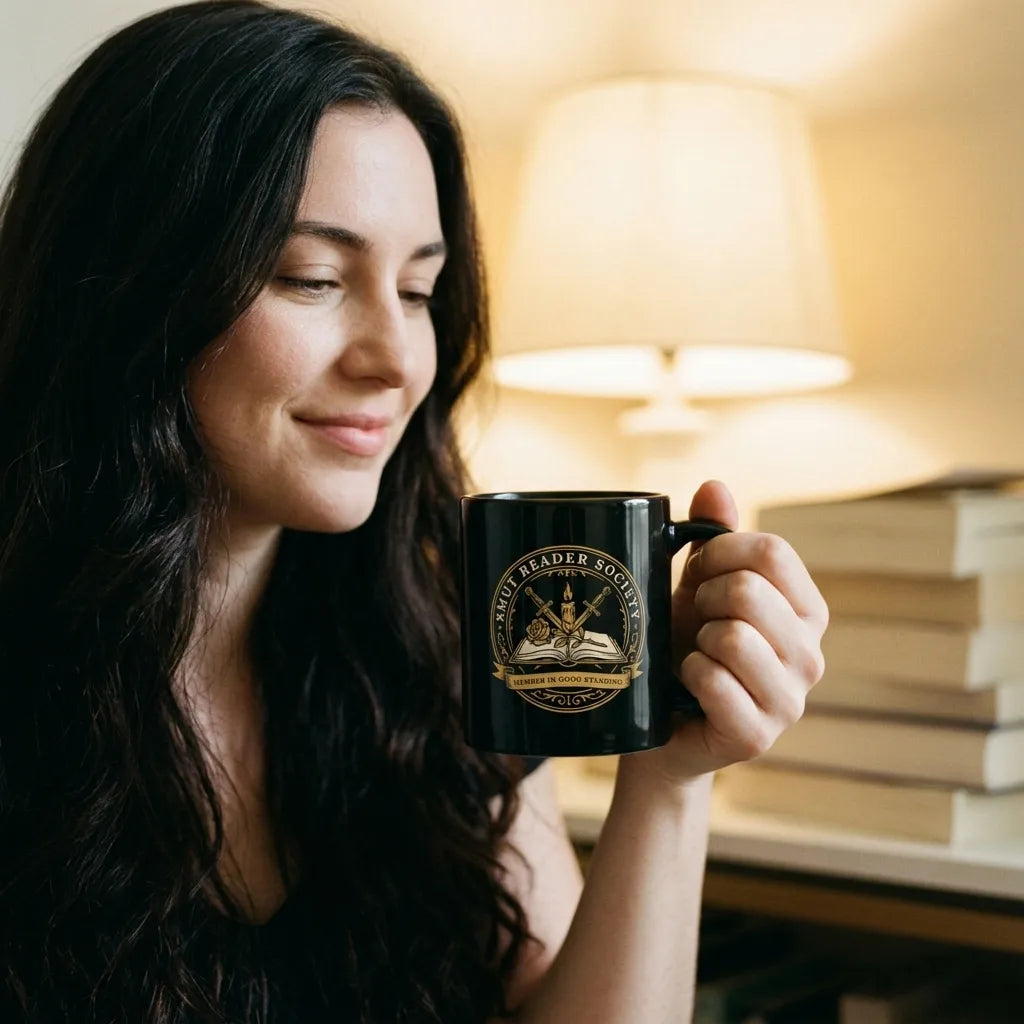 Smut Reader Society romantasy black ceramic mug — lifestyle