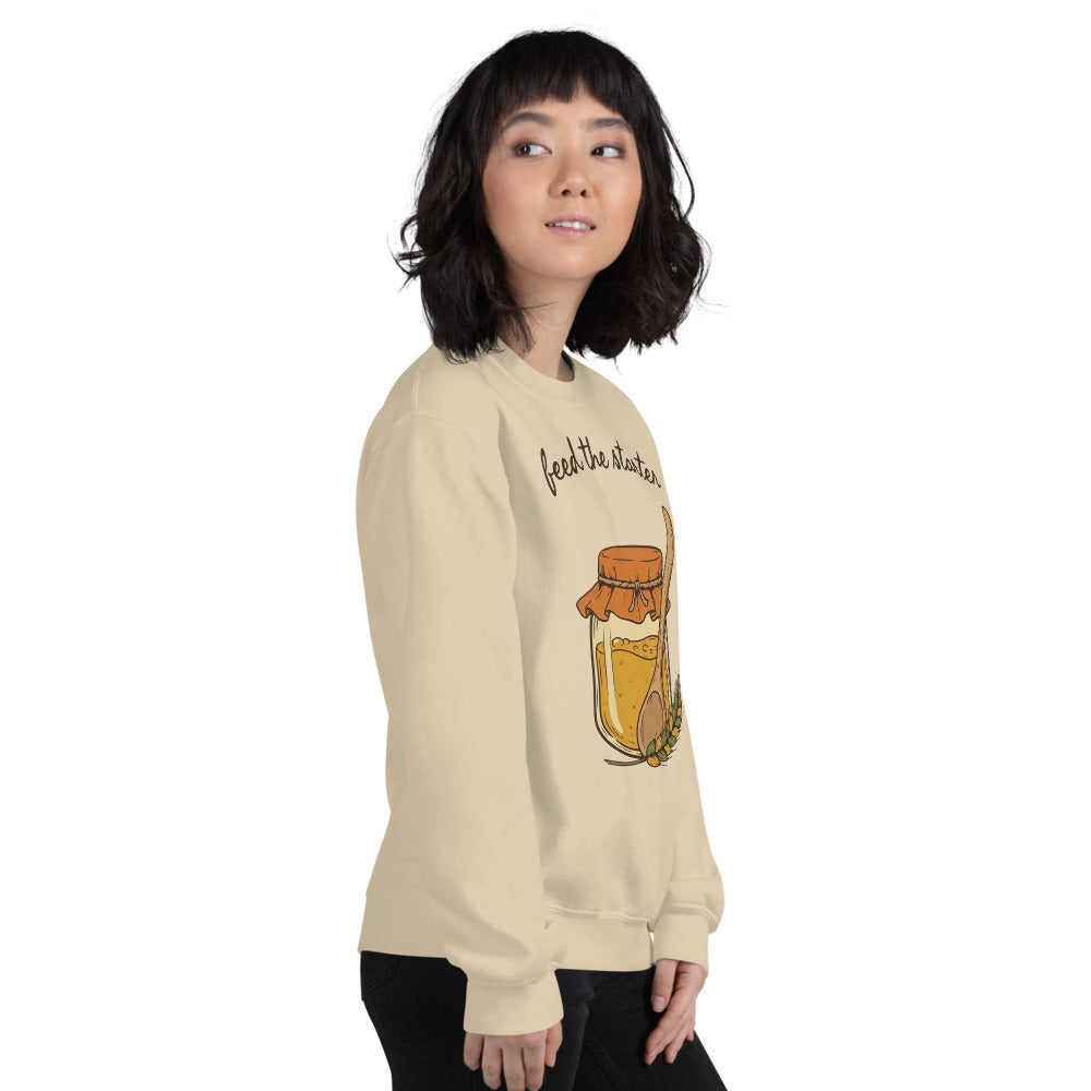 Feed The Starter sourdough baker crewneck sweatshirt — Sand, on model