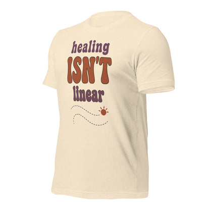 Healing Isn't Linear soft retro mental health tee — Heather Natural, front right