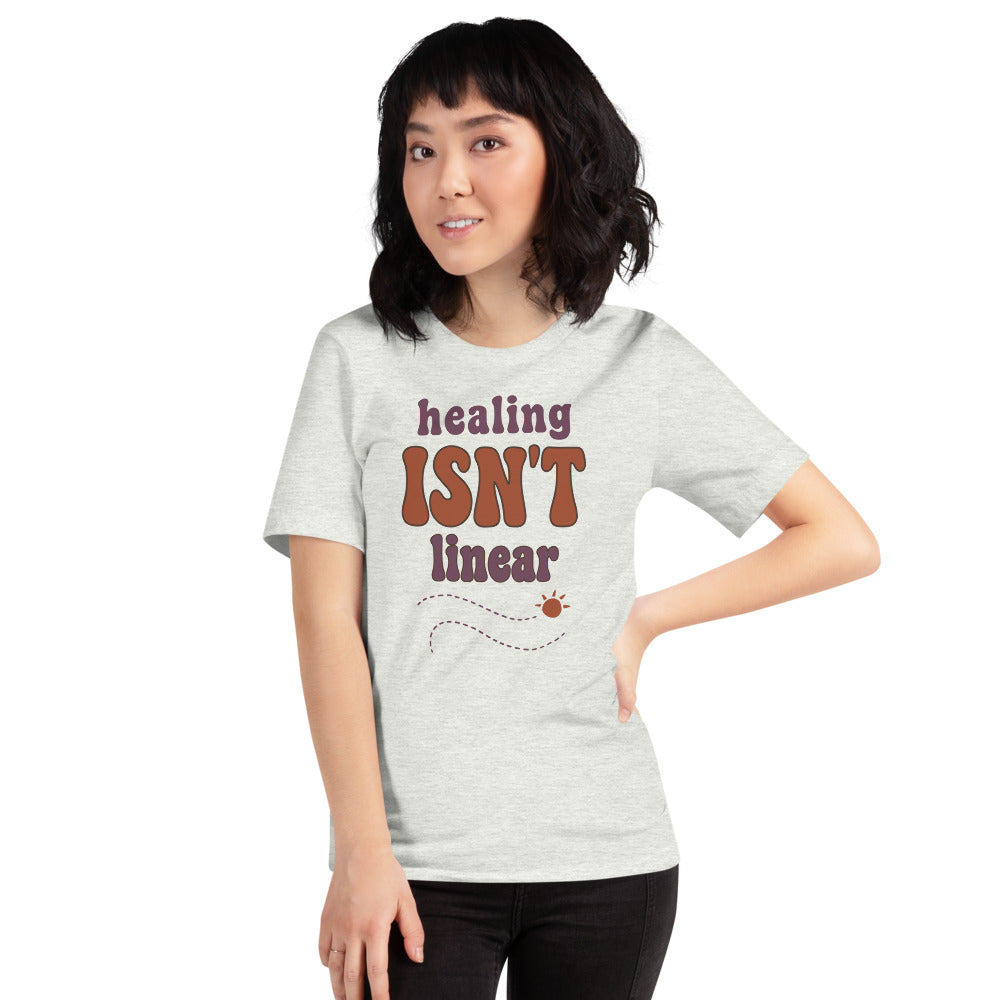 Healing Isn't Linear soft retro mental health tee — Ash, on model