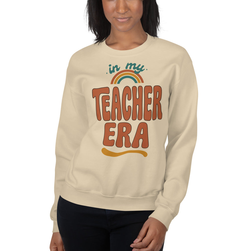In My Teacher Era retro groovy teacher crewneck sweatshirt — Sand, on model