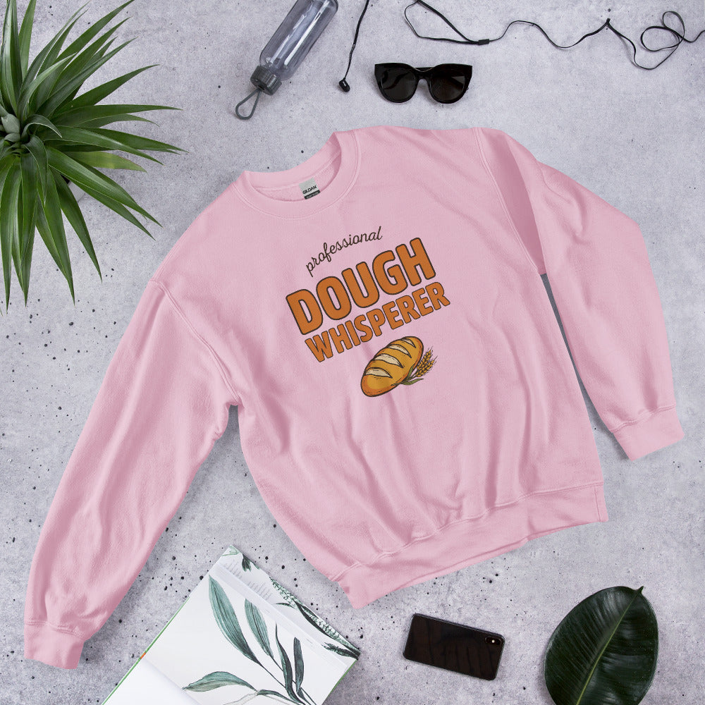 Professional Dough Whisperer funny baker crewneck sweatshirt — Light Pink, front angled