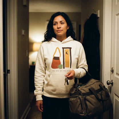 The Bag By The Door doula hoodie — lifestyle