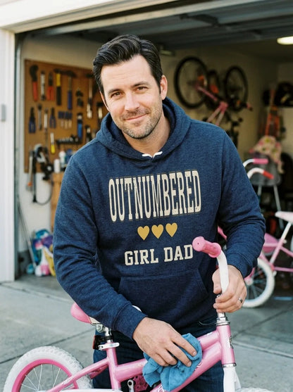 Girl Dad Outnumbered & Proud hoodie — lifestyle