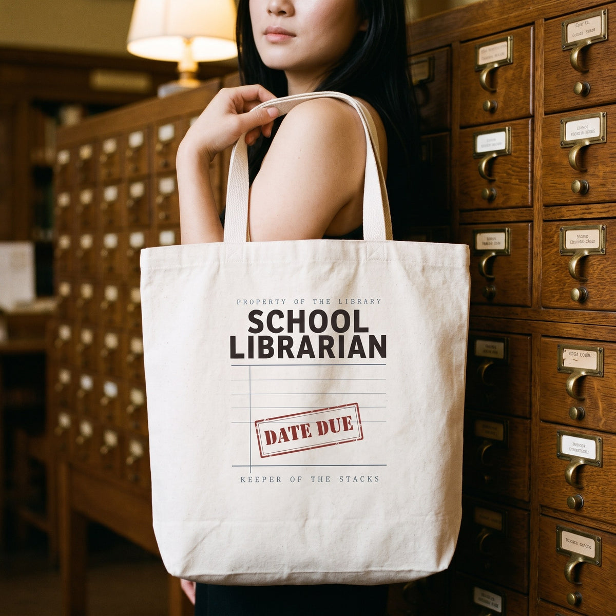 Property of the School Library card catalog school librarian cotton tote bag — lifestyle