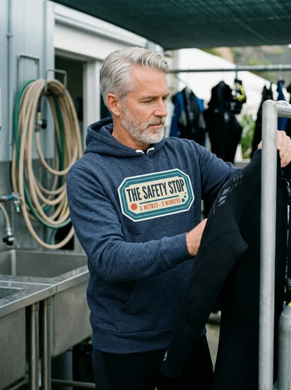 The Safety Stop vintage scuba diving travel decal hoodie — lifestyle