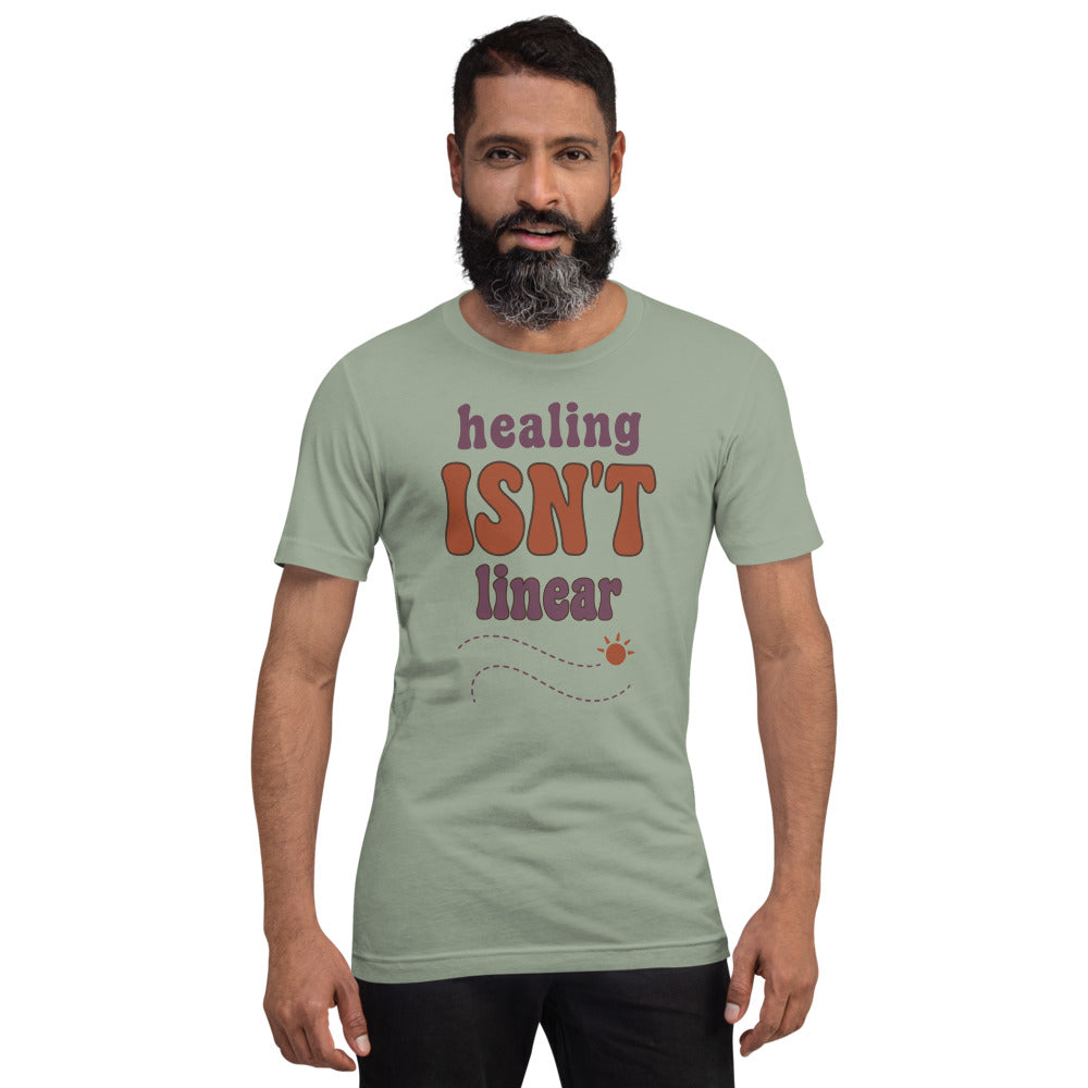 Healing Isn't Linear soft retro mental health tee — Sage, on model