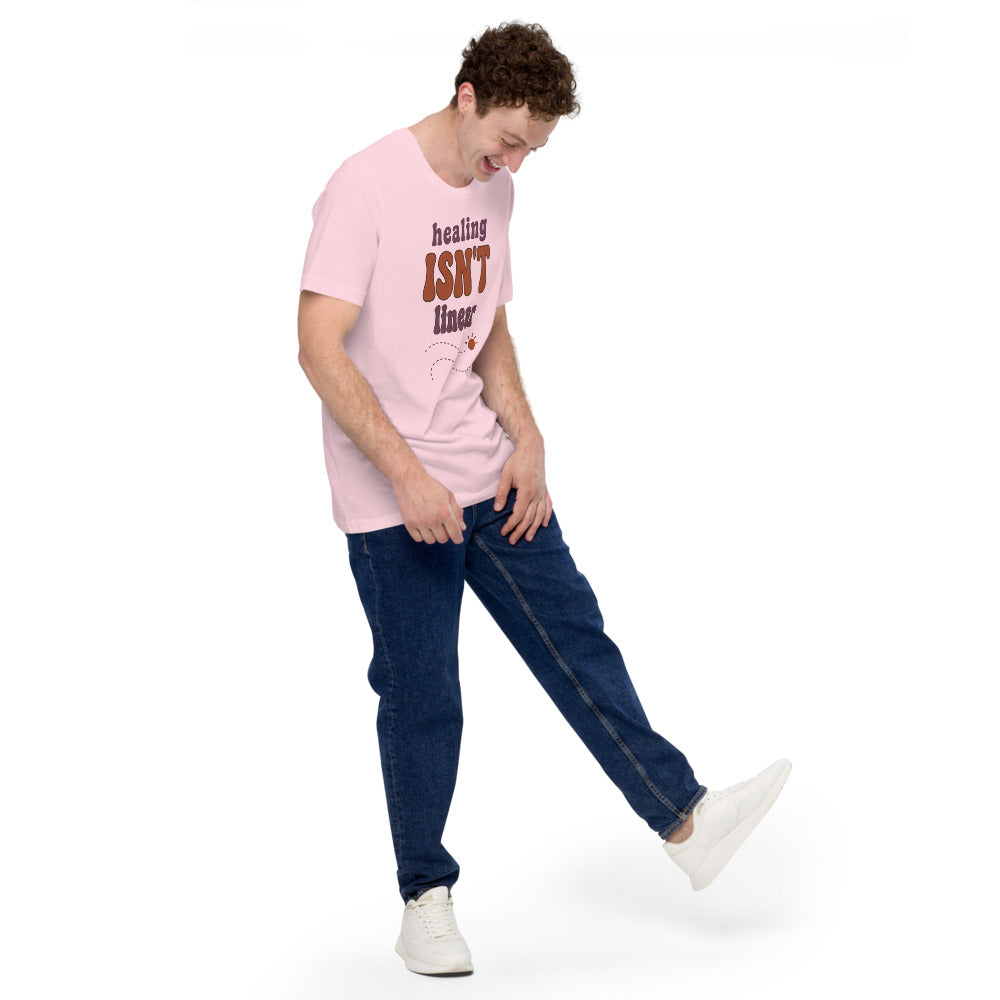 Healing Isn't Linear soft retro mental health tee — Soft Pink, on model