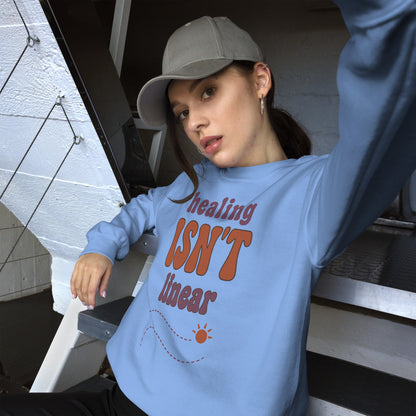 Healing Isn't Linear soft retro mental health crewneck sweatshirt — Carolina Blue, worn by model