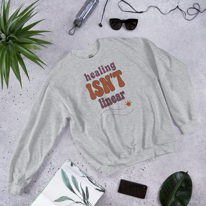 Healing Isn't Linear soft retro mental health crewneck sweatshirt — Sport Grey, front angled