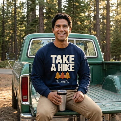 Take a Hike retro outdoors humor crewneck sweatshirt — man on a camp truck tailgate wearing Navy