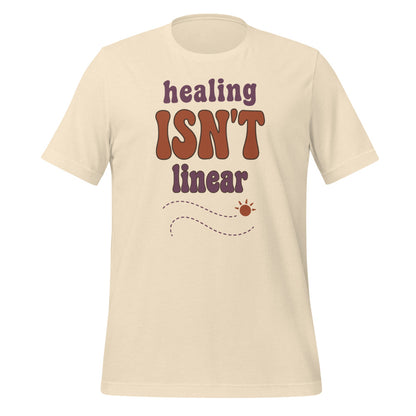 Healing Isn't Linear soft retro mental health tee — Heather Natural, front