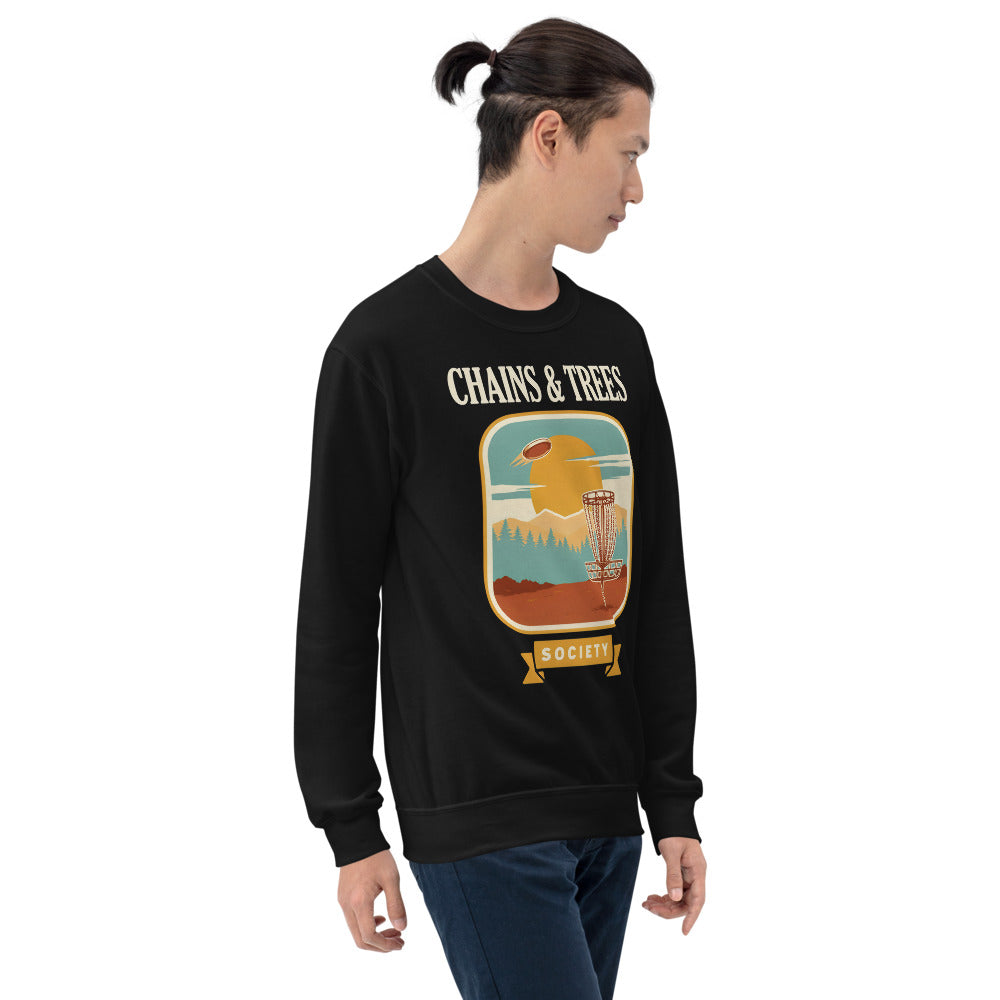 Chains & Trees Society disc golf retro landscape crewneck sweatshirt — Black, on model