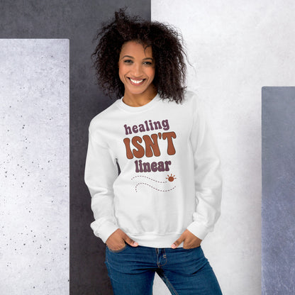 Healing Isn't Linear soft retro mental health crewneck sweatshirt — White, worn by model