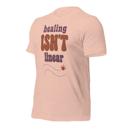 Healing Isn't Linear soft retro mental health tee — Heather Prism Peach, front right