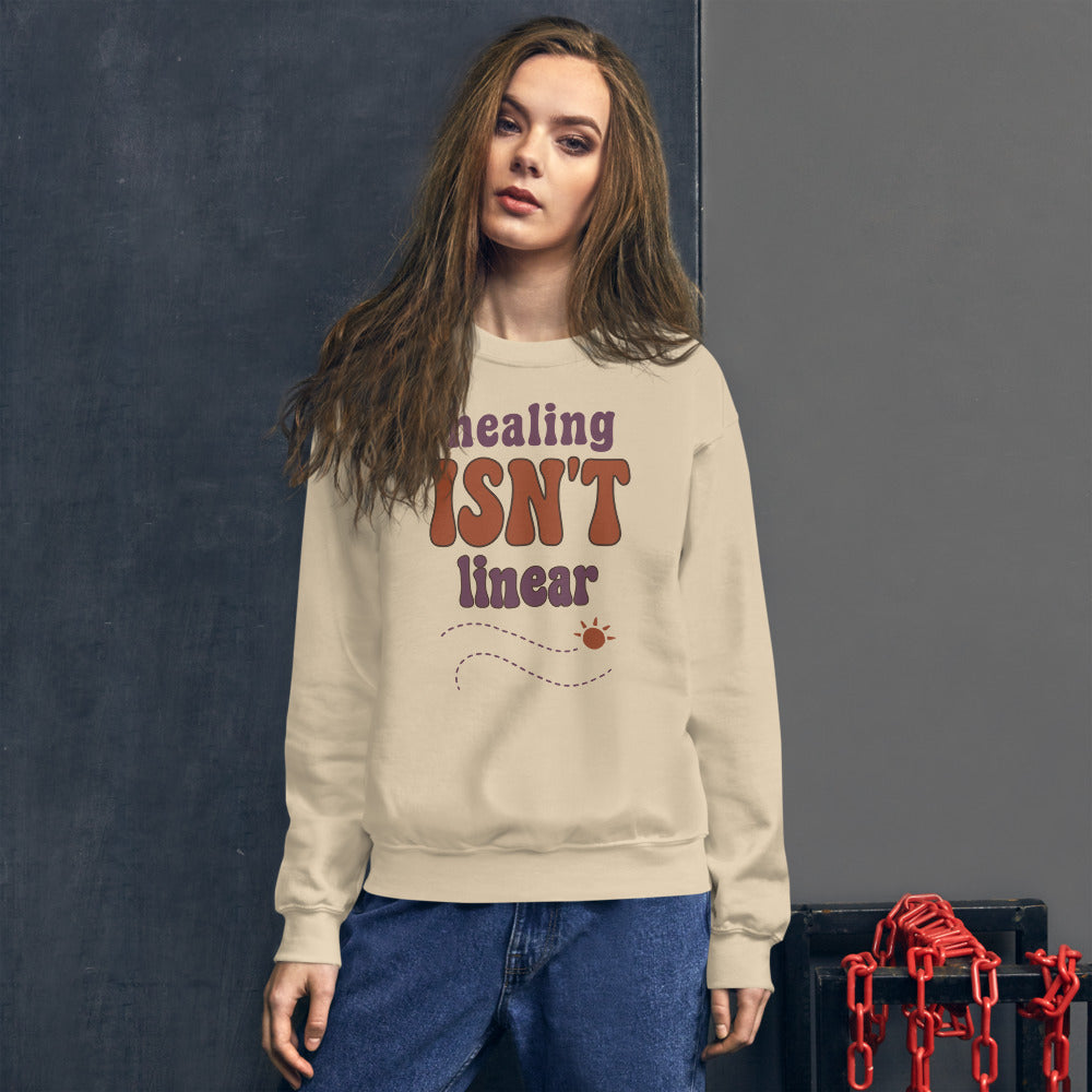 Healing Isn't Linear soft retro mental health crewneck sweatshirt — Sand, worn by model