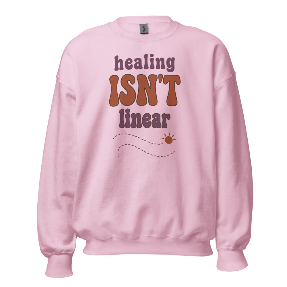 Healing Isn't Linear soft retro mental health crewneck sweatshirt — Light Pink, front