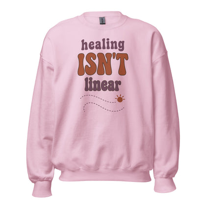 Healing Isn't Linear soft retro mental health crewneck sweatshirt — Light Pink, front