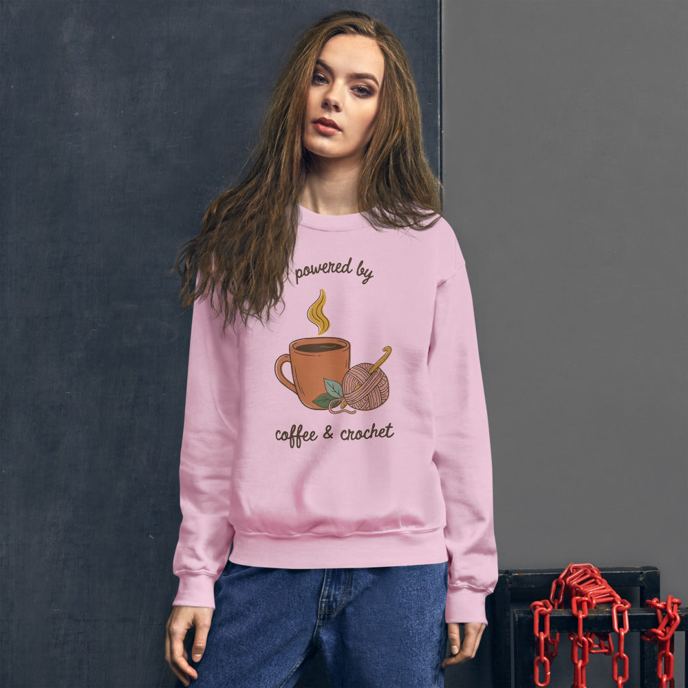 Powered by Coffee and Crochet cottagecore crochet crewneck sweatshirt — Light Pink, on model