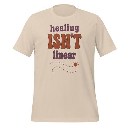 Healing Isn't Linear soft retro mental health tee — Soft Cream, front