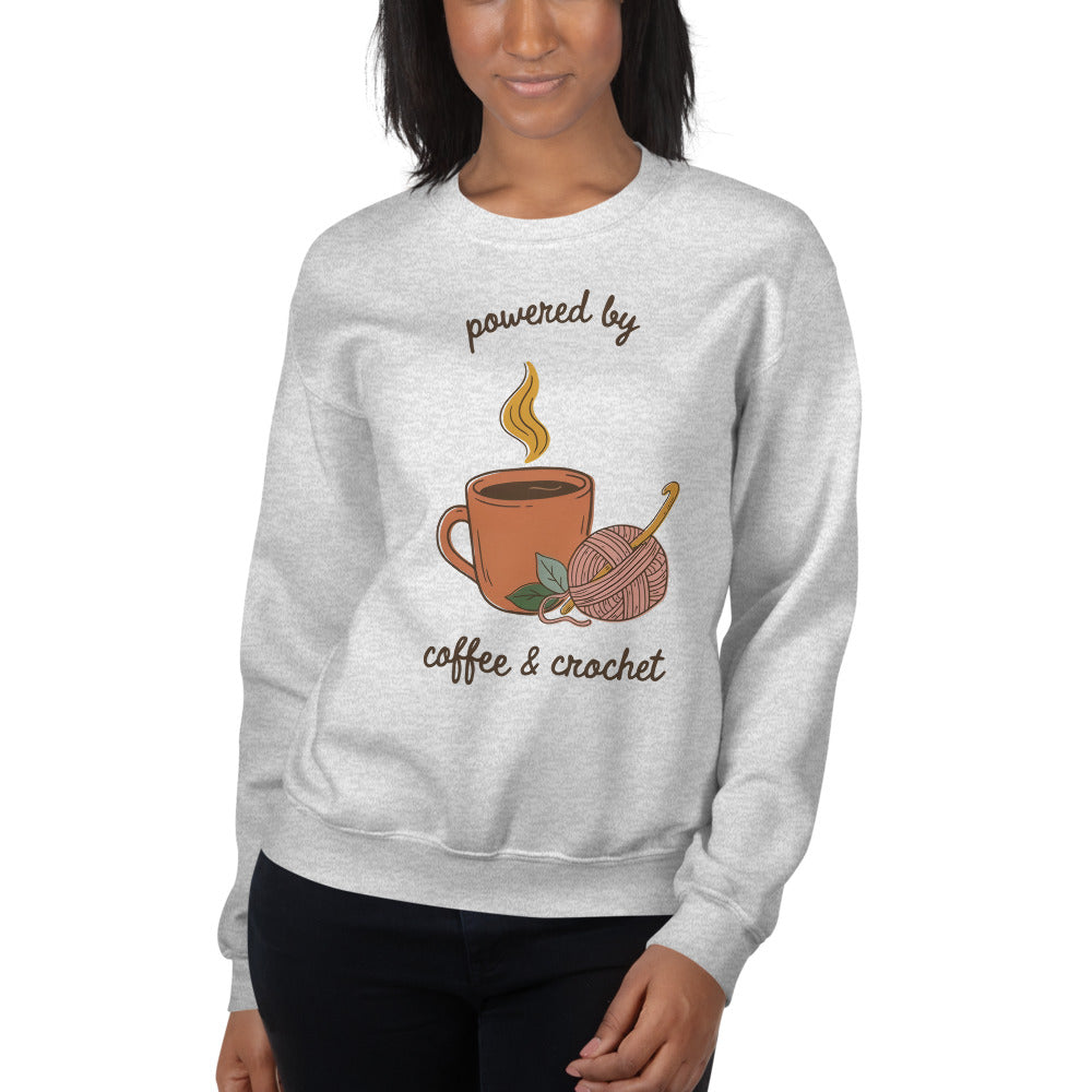 Powered by Coffee and Crochet cottagecore crochet crewneck sweatshirt — Ash, on model