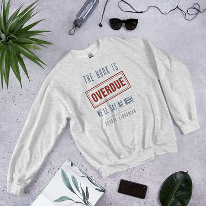 The Book Is Overdue funny school librarian crewneck sweatshirt — Ash, front-right