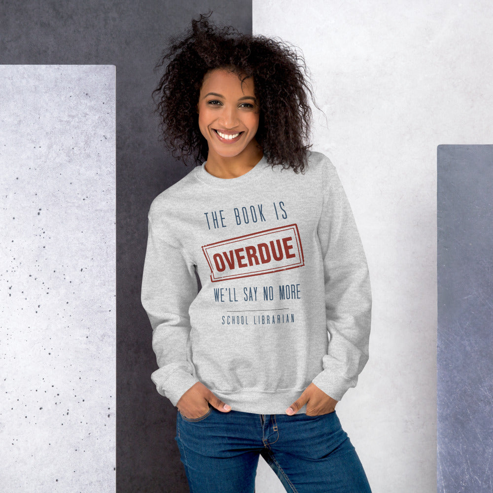 The Book Is Overdue funny school librarian crewneck sweatshirt — Ash, on model