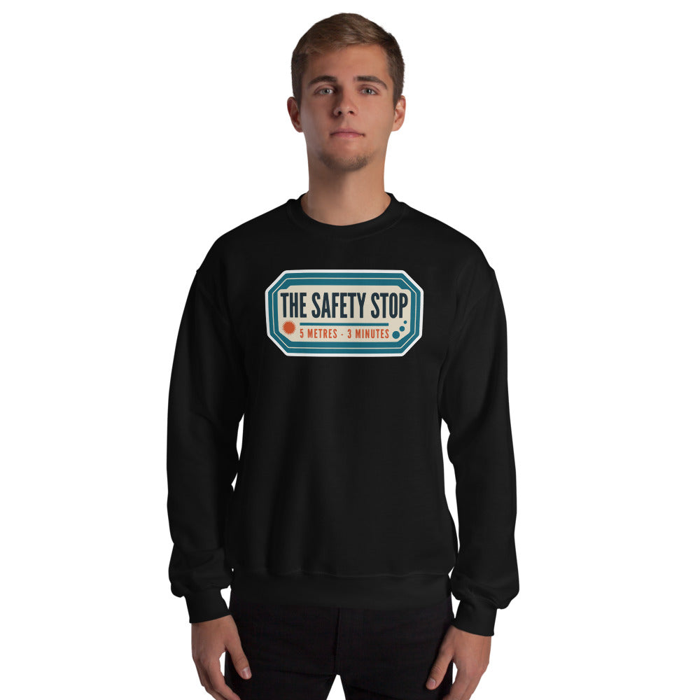 The Safety Stop vintage scuba diving travel decal sweatshirt — Black, on model