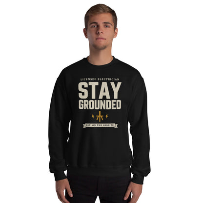 Stay Grounded funny electrician crewneck — Black, on model