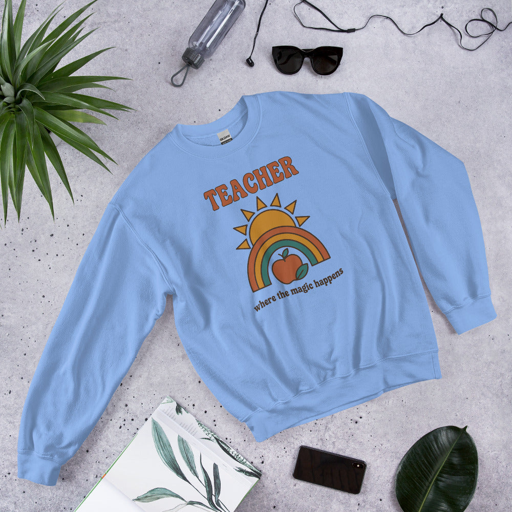 Teacher Where The Magic Happens retro groovy teacher crewneck sweatshirt — Carolina Blue, front angle