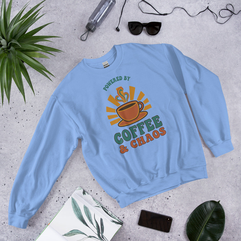 Powered By Coffee And Chaos retro groovy teacher crewneck sweatshirt — Carolina Blue, front view