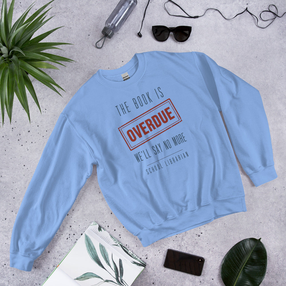 The Book Is Overdue funny school librarian crewneck sweatshirt — Carolina Blue, front-right