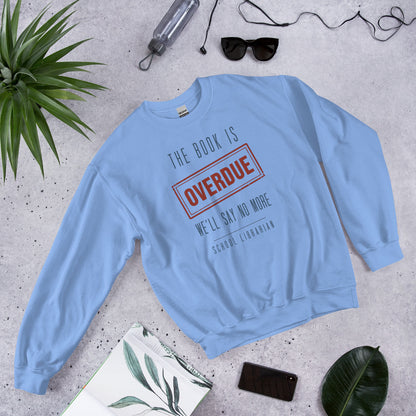 The Book Is Overdue funny school librarian crewneck sweatshirt — Carolina Blue, front-right