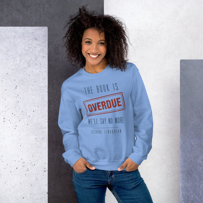 The Book Is Overdue funny school librarian crewneck sweatshirt — Carolina Blue, on model