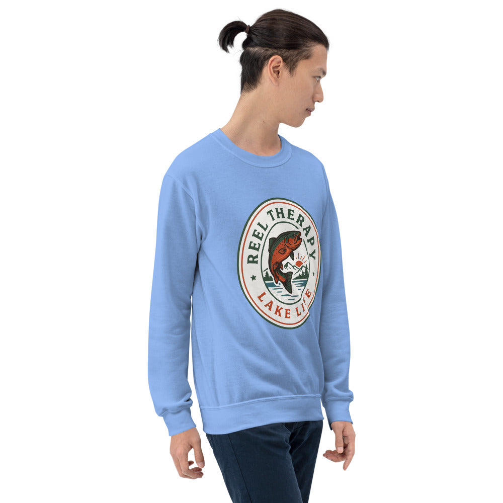 Reel Therapy retro national-park trout badge fishing crewneck sweatshirt — Carolina Blue, on model