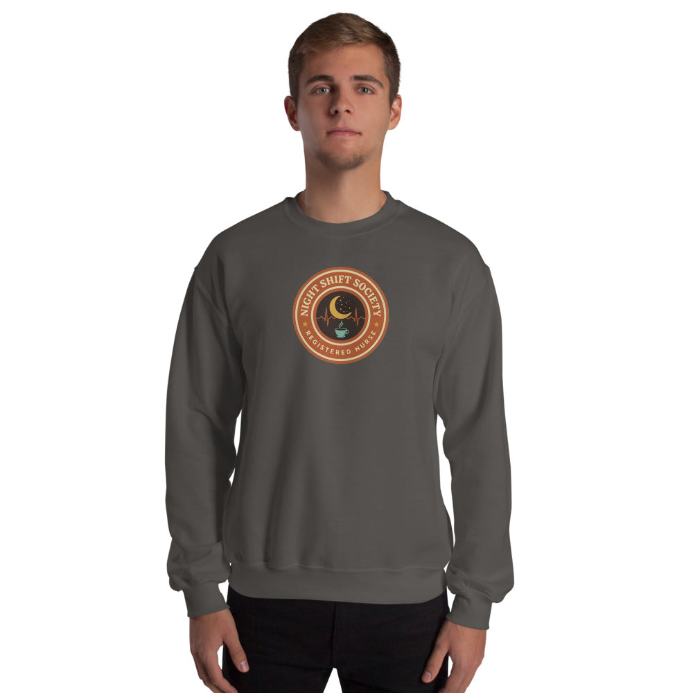 Night Shift Society retro registered nurse badge crewneck sweatshirt — Charcoal, on model