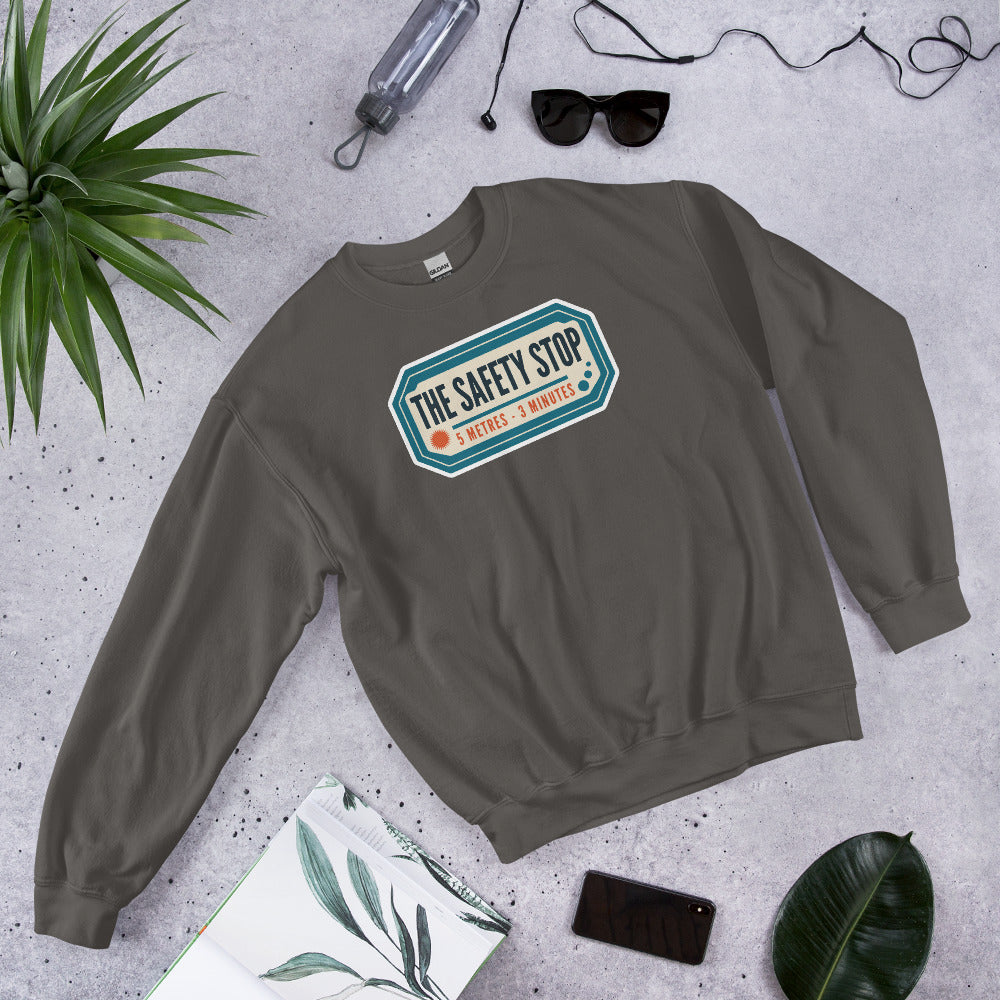 The Safety Stop vintage scuba diving travel decal sweatshirt — Charcoal, flat lay