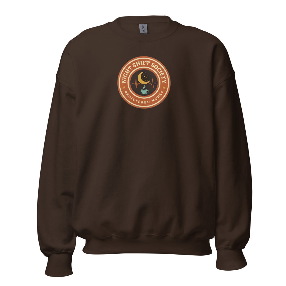 Night Shift Society retro registered nurse badge crewneck sweatshirt — Dark Chocolate, front