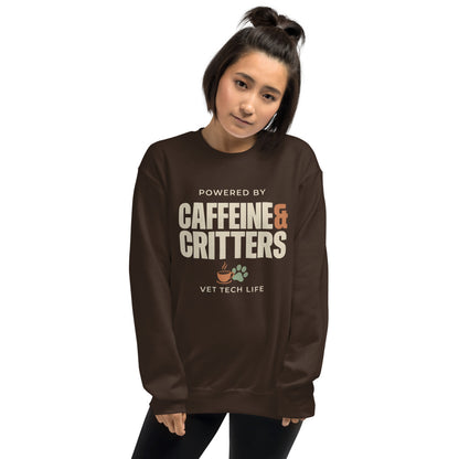 Powered by Caffeine & Critters funny vet tech crewneck sweatshirt — Dark Chocolate, on model
