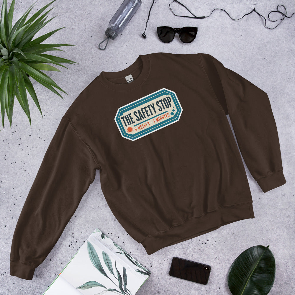 The Safety Stop vintage scuba diving travel decal sweatshirt — Dark Chocolate, flat lay