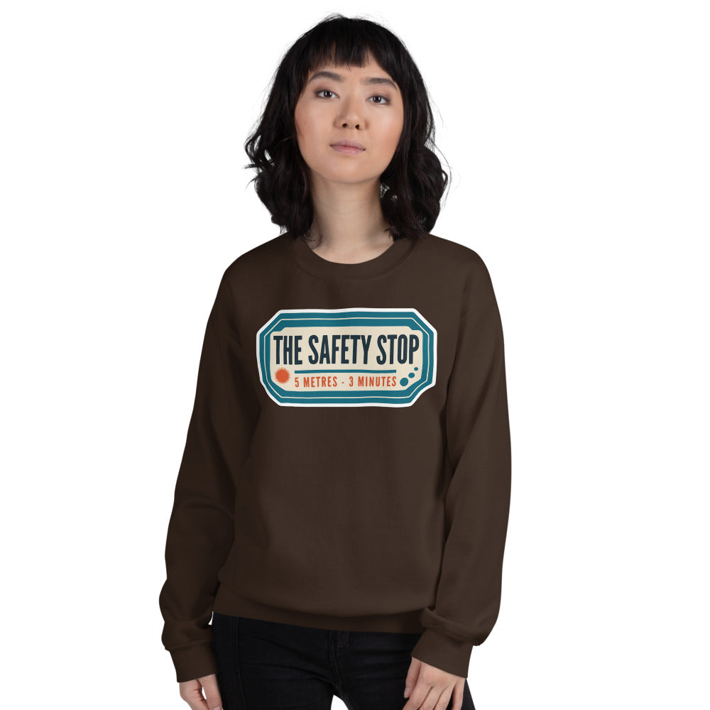 The Safety Stop vintage scuba diving travel decal sweatshirt — Dark Chocolate, on model