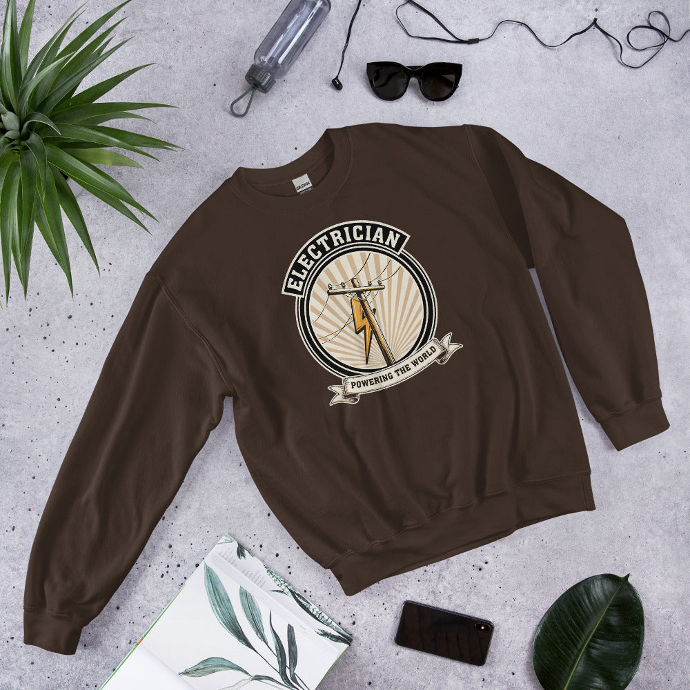 Powering The World electrician emblem crewneck — Dark Chocolate, flat lay